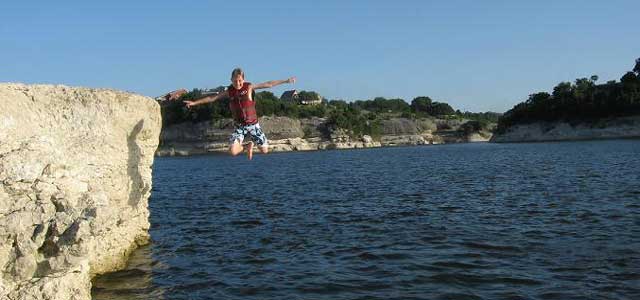 Jumping from the cliffs at Lake Whitney, Texas